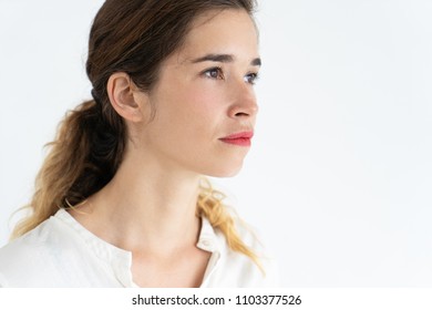 Serious Beautiful Young Brown-haired Woman. Woman Portrait Concept. Isolated View On White Background.