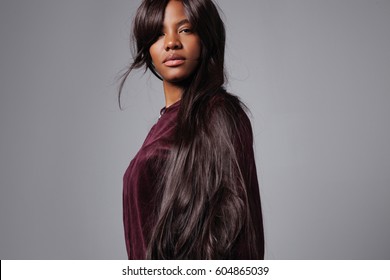 Serious Black Mixed Race Woman Wears Wig