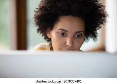 Serious Black Student Girl Working On Study Research At Computer. Thoughtful Young Female Employee, Worker, Designer Using Workstation, Looking At Monitor, Thinking Over Project Tasks. Cropped Shot