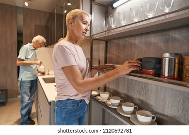 Serious Blonde Taking Box With Black Tea