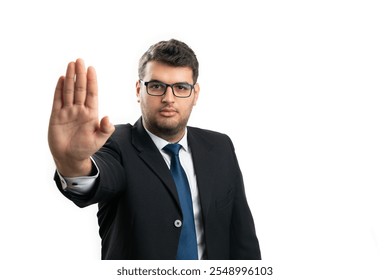 Serious businessman corporate wearing office smart suit and spectacles glasses showing stop gesture using palm with blank copyspace for advertising isolated on white - Powered by Shutterstock