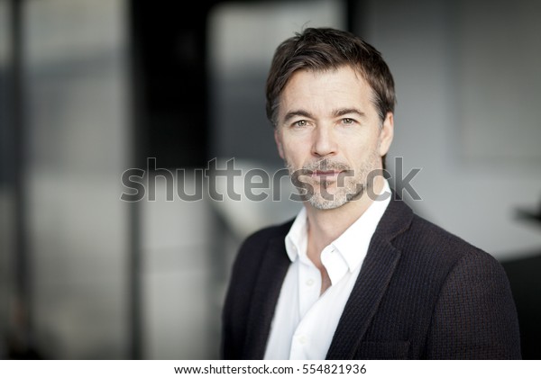 Serious Businessman Looking Camera Office Stock Photo Edit Now