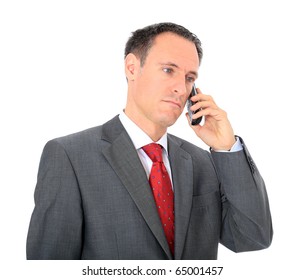 Serious Businessman Making A Phone Call. All On White Background.