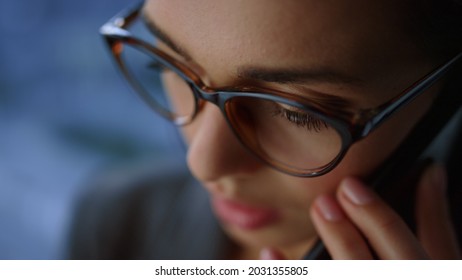 Serious Businesswoman Face Calling Phone. Closeup Female Entrepreneur Talking Smartphone In Office. High Angle View Confident Business Woman Finishing Mobile Phone Conversation With Partner