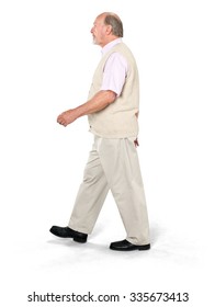 Serious Caucasian Elderly Man With Short Grey Hair In Casual Outfit Walking - Isolated
