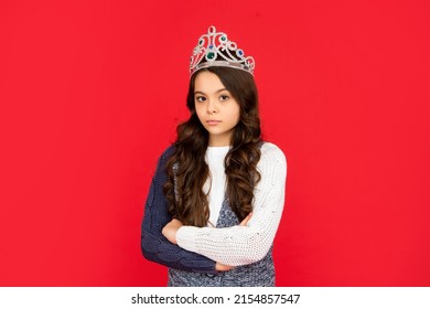 Serious Child In Queen Crown. Expressing Smug. Arrogant Princess In Tiara. Proud Kid.