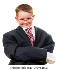 Serious Child Wearing Suit That Is Too Big For Him