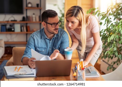 Serious couple having finance problems.