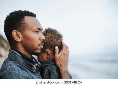 Serious dad with his son outdoors - Powered by Shutterstock