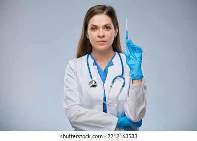 Serious Doctor Holding Syringe With Vaccine. Isolated Female Medical Worker Portrait.