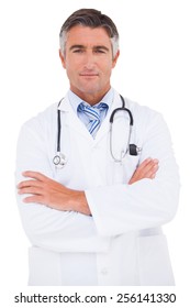 Serious Doctor Looking At Camera On White Background