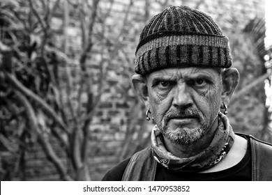 Serious Facial Expression, Wrinkled Face Looking Towards Camera