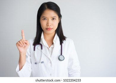 Serious Female Doctor Pointing Finger Stock Photo 1022204233 | Shutterstock