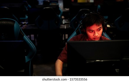 Serious Gamer Getting Angry Playing Game On Computer With His Teammate.