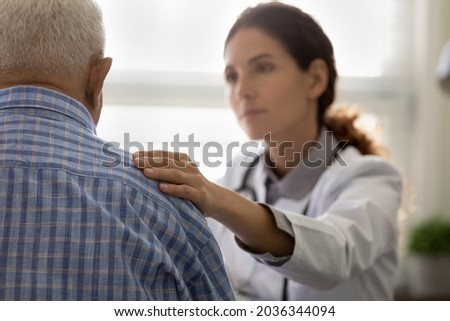 Similar – Image, Stock Photo Medic giving bad diagnosis to patient