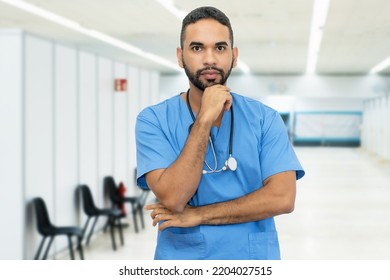 Serious Hispanic Male Nurse Or Doctor At Hospital