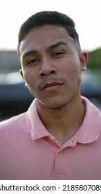 A Serious Hispanic Man Portrait Looking At Camera. A Latin South American Person