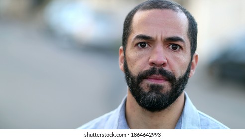 Serious Hispanic Portrait Man Close-up Face. 40 Year Old Person, Real People Series