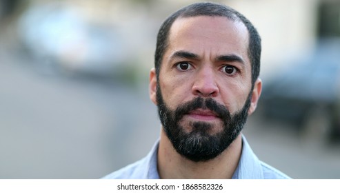 Serious Hispanic Portrait Man Close-up Face. 40 Year Old Person, Real People Series