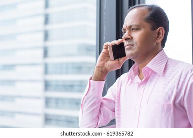 Serious Indian Man Talking On Phone Stock Photo 619365782 | Shutterstock
