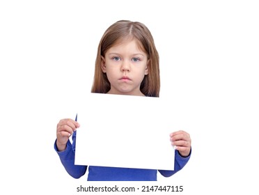 Serious Kid Holding Empty Sheet Of Paper As Mock Up On White Background Caucasian Little Girl Of 5 Years In Blue Waist Up