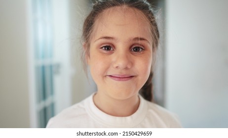 Serious Little Girl Portrait. Happy Family A Problems Kid Dream Concept. Sad Frowning Little Girl Close-up Indoors Lifestyle. Depression Unhappy Child. Lonely Frightened Daughter Portrait