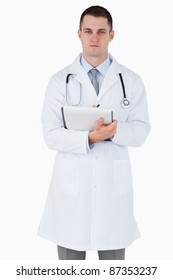 Serious Looking Doctor On White Background