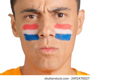 Serious man with a dutch flag painted on the face - Powered by Shutterstock