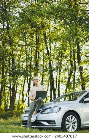 Similar – Image, Stock Photo Young women looking road map with 4×4 on background