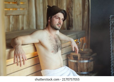 Serious Man Having A Sauna Bath In A Steam Room