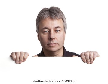 Serious Man Holding A Blank Sign