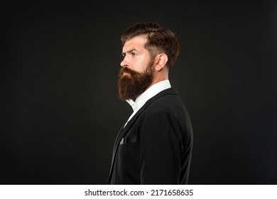 Serious Man In Tuxedo Bow Tie. Man Profile In Formalwear On Black Background. Male Formal Fashion