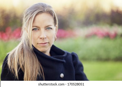 Serious Mature Woman Looking At The Camera