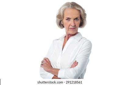 Serious Mature Woman Posing Over White