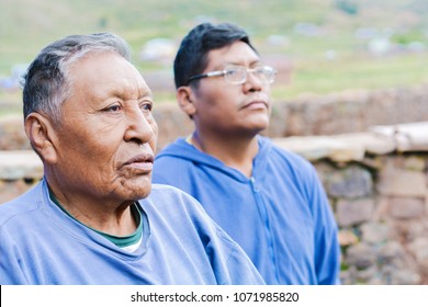 Serious Native American Elderly Father And Son In The Countryside.