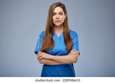 Serious Nurse Woman In Blue Medical Uniform. Isolated Female Portrait.