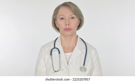 Serious Old Female Doctor On White Background