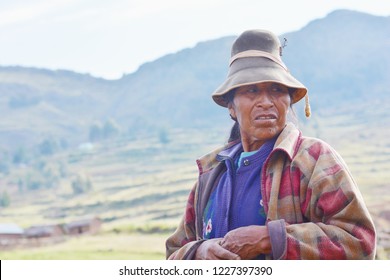 Serious Old Native American Woman In The Countryside.