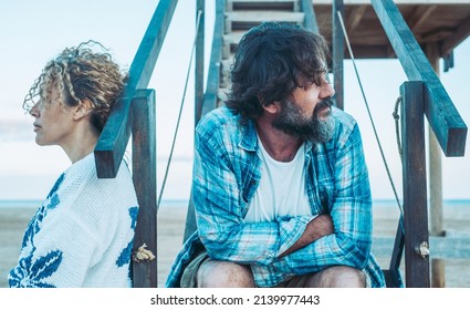 Serious Pensive Adult Man Thinking Of Relationships Problems Sitting Outdoor With Offended Wife, Conflicts In Marriage, Upset Couple After Fight Dispute, Making Decision Of Breaking Up Get Divorced