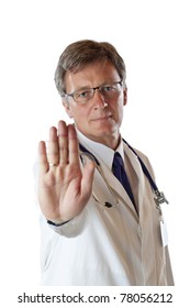 Serious Physician shows stop sign  because of risk of infection. Isolated on white background.
