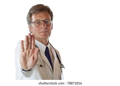 Serious Physician shows stop sign  because of risk of infection. Isolated on white background.