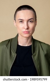 Serious Skinhead Woman In Studio Shoot