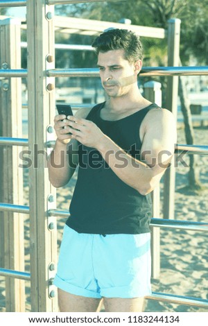 Similar – Image, Stock Photo Young sportsman drinking water after jogging