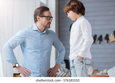 Serious Strict Man Looking At His Son