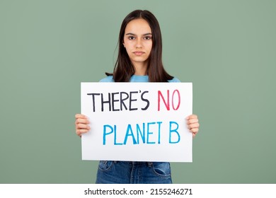 Serious Teen Girl Enviromental Activist Holding A Banner With There Is No Planet B Text Against A Green Background