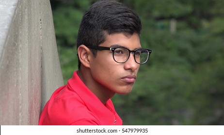 Serious Teen Hispanic Male Wearing Glasses