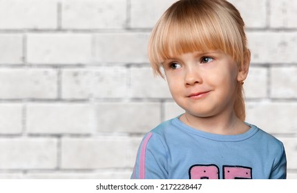 Serious Teen Pose Alone In Living Room. Adolescence, Difficult Personality, Bad Temper, Young Generation