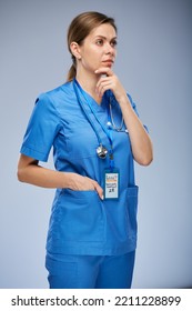 Serious Thinking Doctor Or Nurse Woman Looking Away. Isolated Female Portrait.