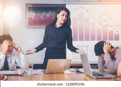 Serious Woman Boss Scolding Marketing Team Employee For Bad Business Result In Meeting