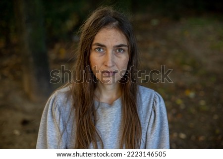 serious woman looking at the camera